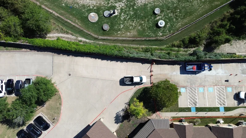 Aerial view of existing commercial pavement and the work area